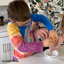 Child conducting a science experiment