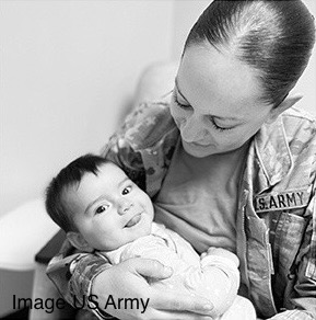 Mom in army clothes holding her baby